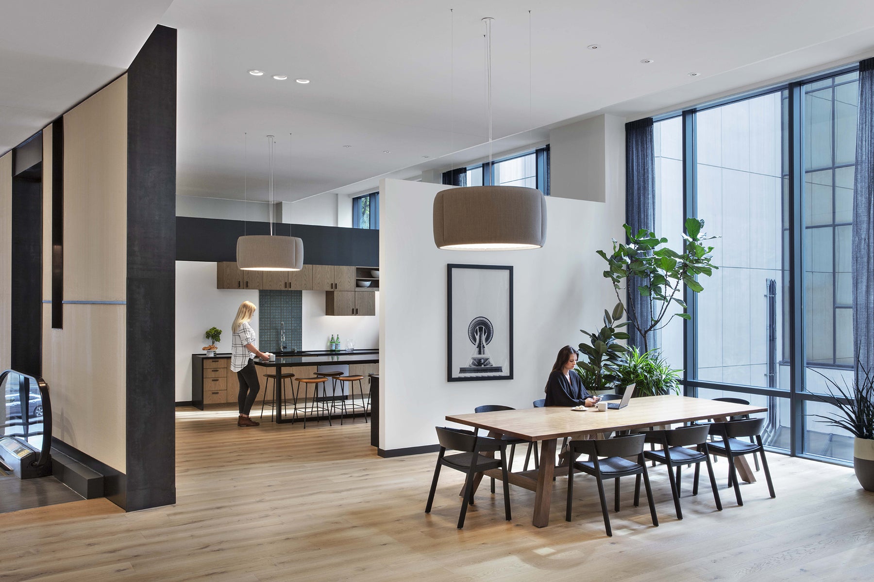 an interior view with midcentury modern furniture and northern wide wood planks on the floor