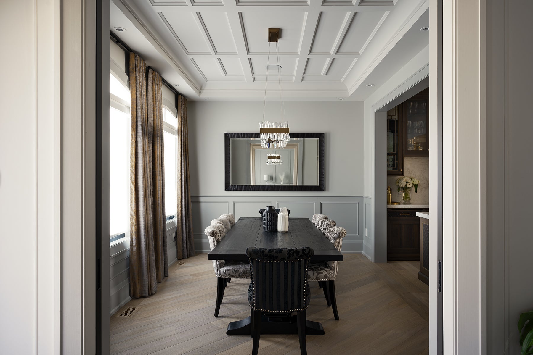 an interior view with midcentury modern furniture and northern wide wood planks on the floor