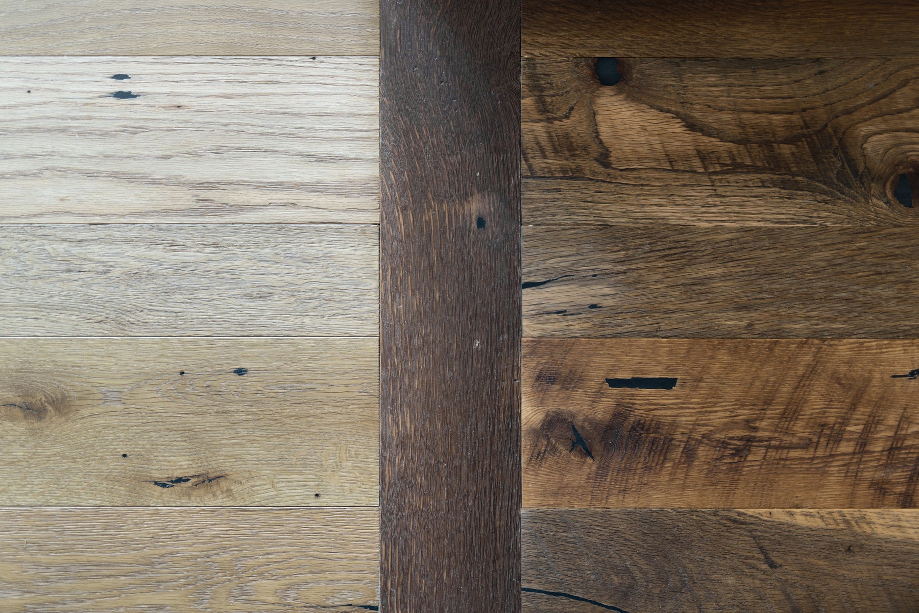 an interior view with midcentury modern furniture and northern wide wood planks on the floor