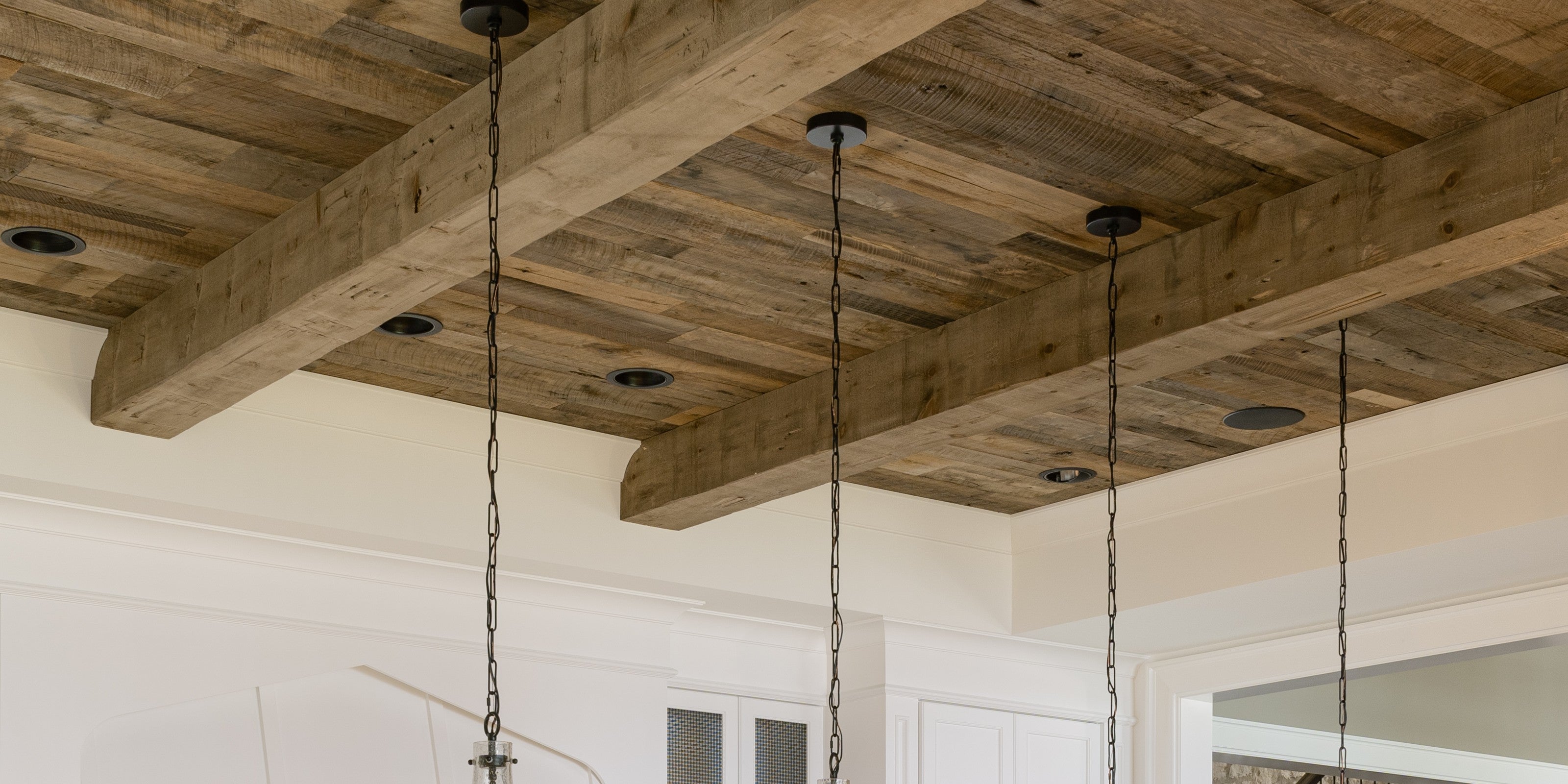 an interior view with midcentury modern furniture and northern wide wood planks on the floor