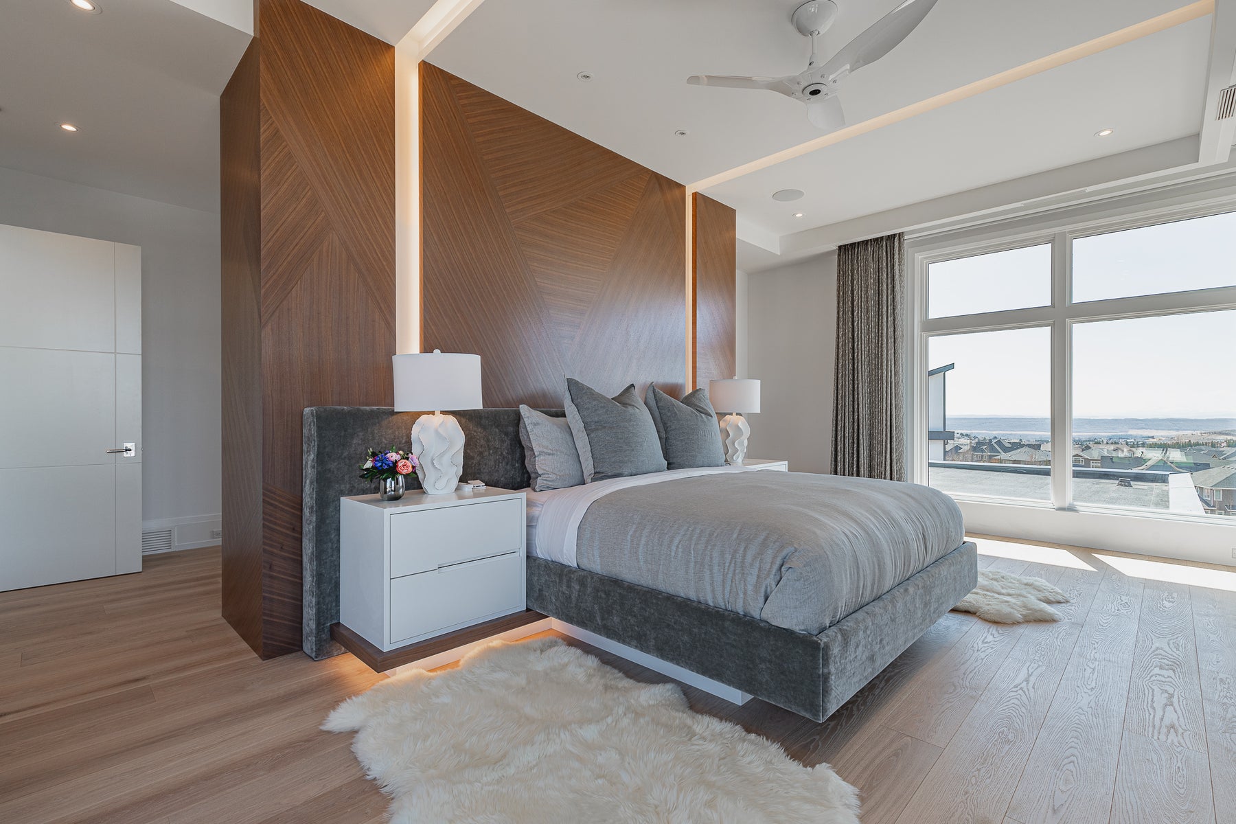 an interior view with midcentury modern furniture and northern wide wood planks on the floor