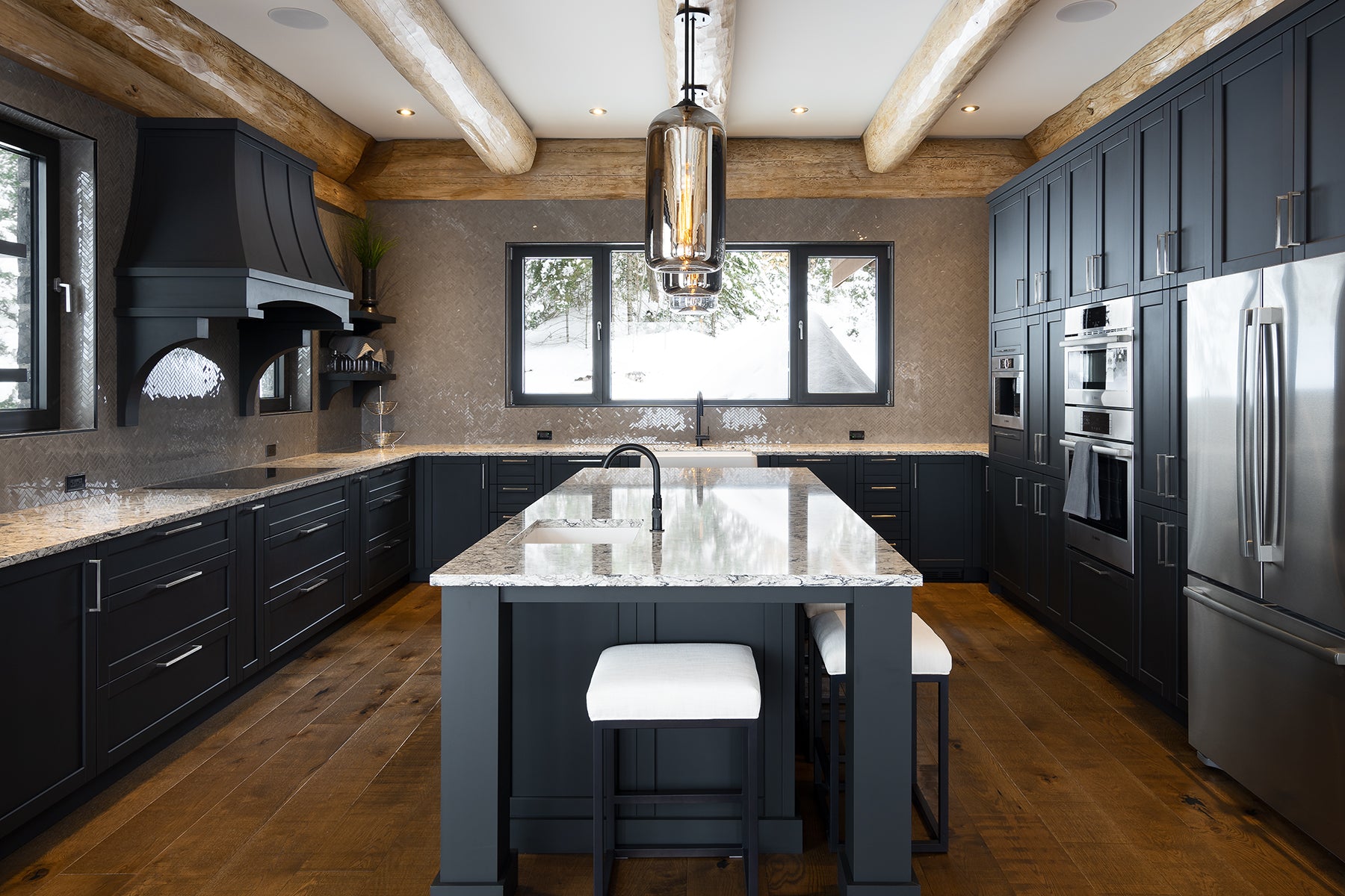 an interior view with midcentury modern furniture and northern wide wood planks on the floor