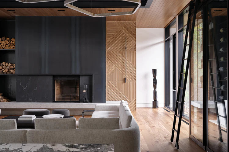 an interior view with midcentury modern furniture and northern wide wood planks on the floor