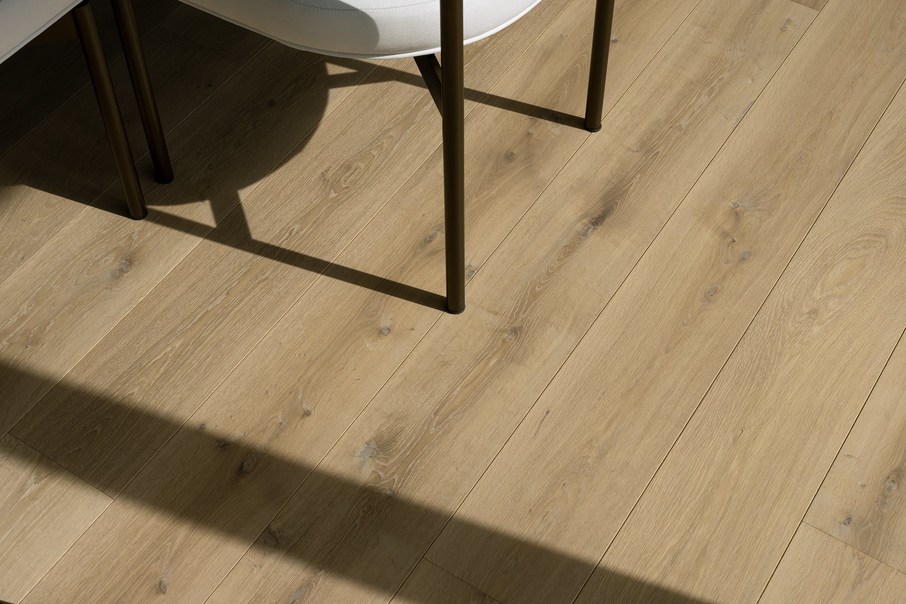 an interior view with midcentury modern furniture and northern wide wood planks on the floor