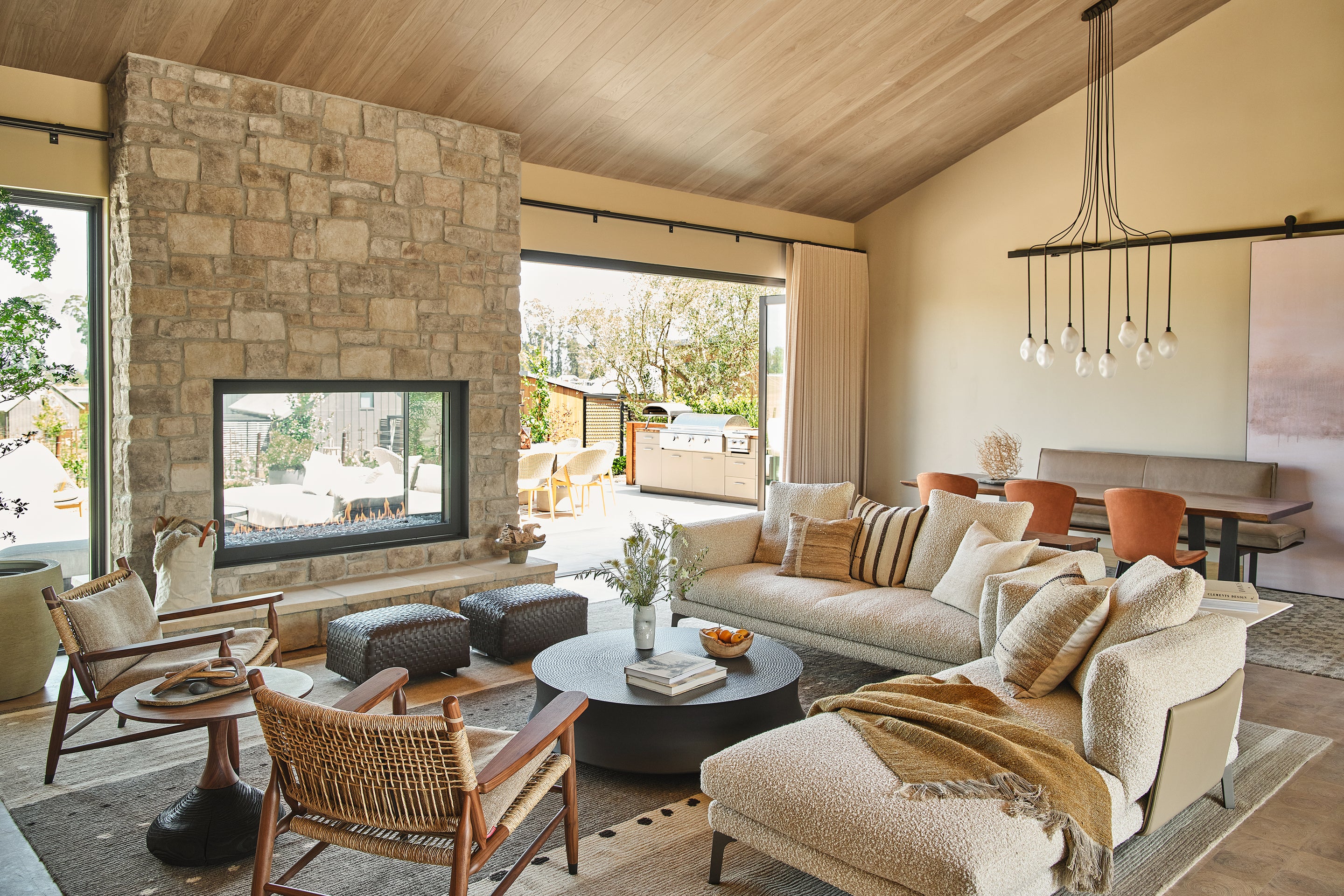 an interior view with midcentury modern furniture and northern wide wood planks on the floor