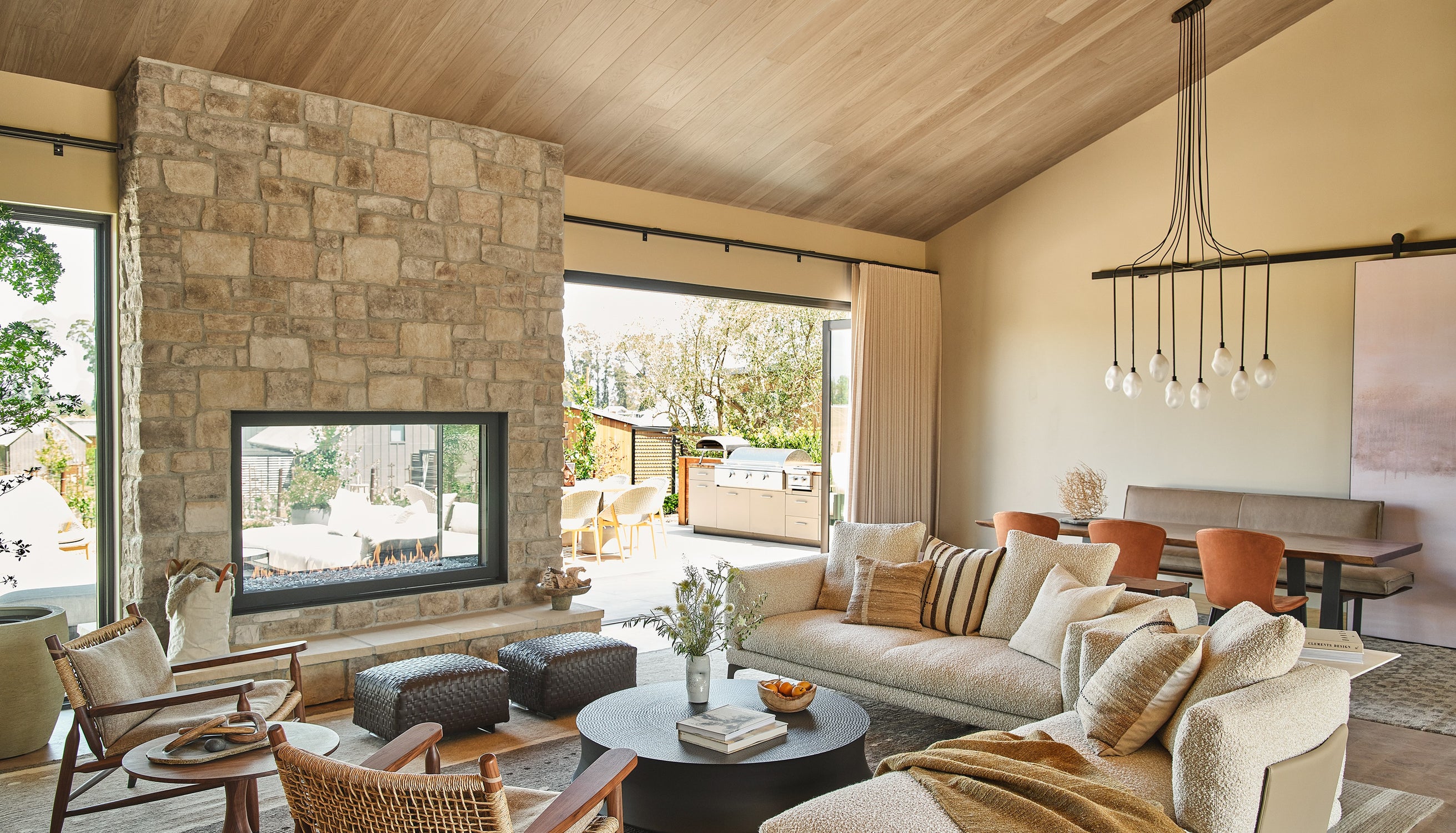 an interior view with midcentury modern furniture and northern wide wood planks on the floor