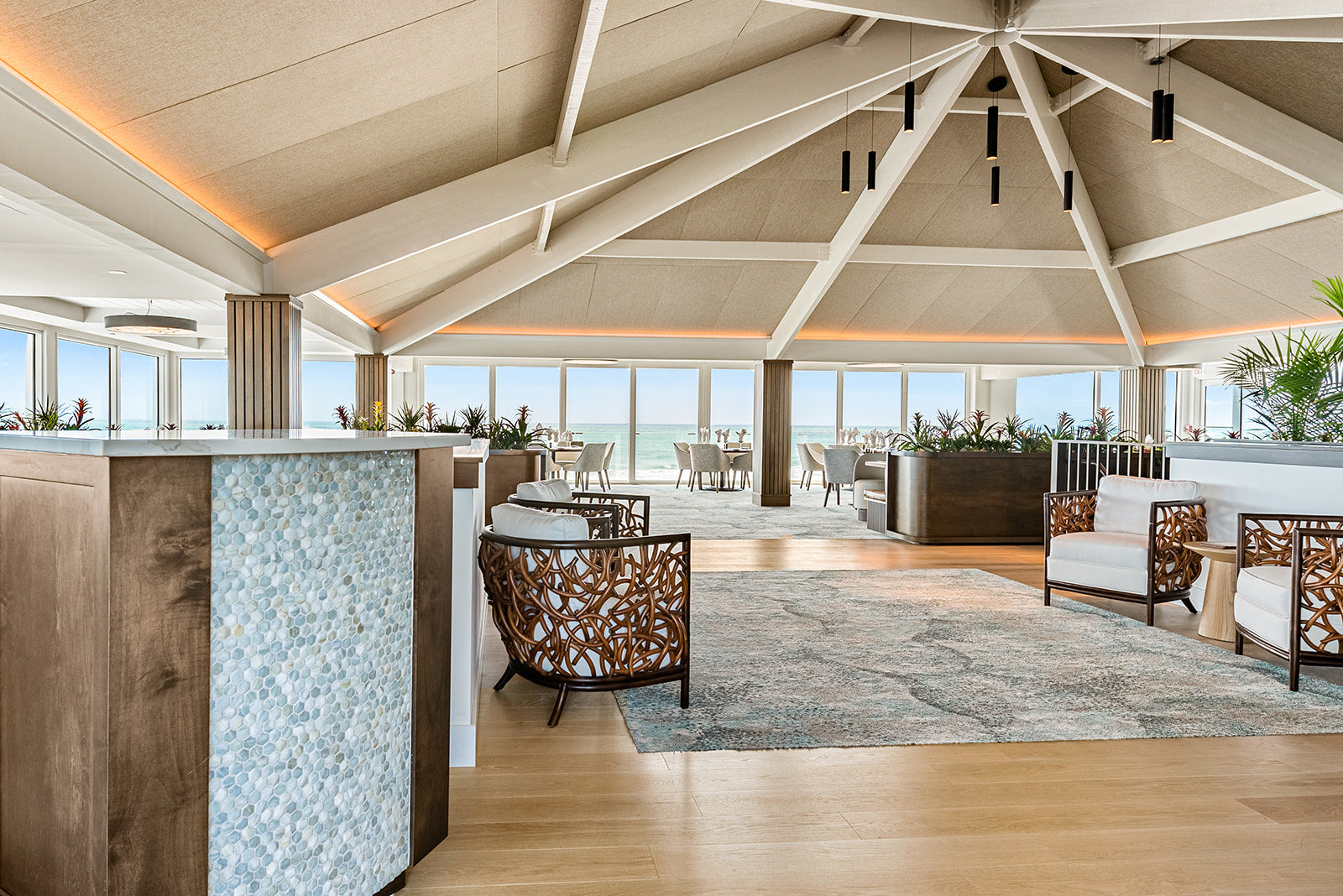 an interior view with midcentury modern furniture and northern wide wood planks on the floor