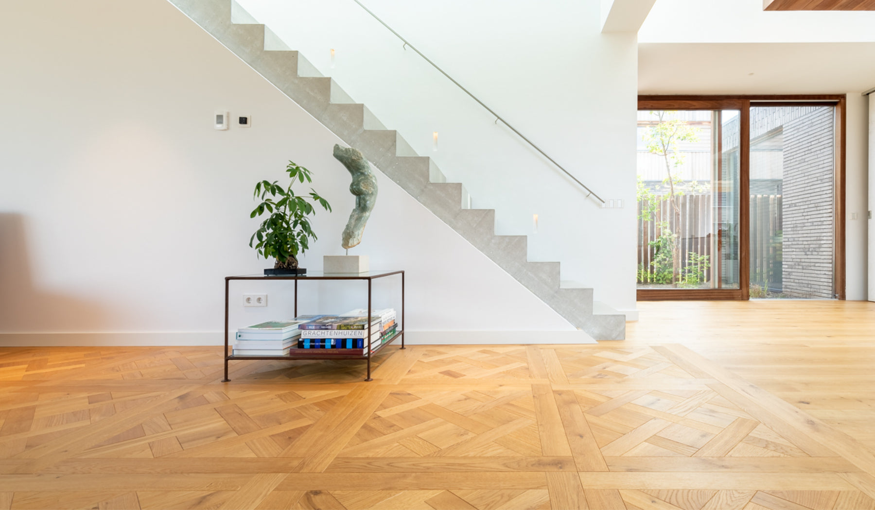 an interior view with midcentury modern furniture and northern wide wood planks on the floor